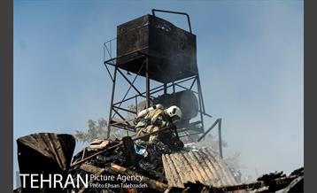 آتش سوزی انبار کالا در خیابان فداییان اسلام 13