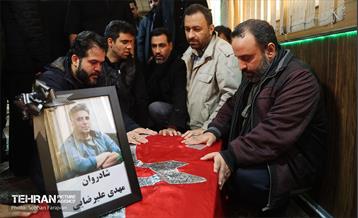 تشییع پیکر خبرنگار فقید مهدی علیرضایی 13