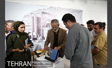 آیین گشایش نمایشگاه عکس ساسان مویدی و رونمایی از مجموعه کتب عکاسان جنگ 13