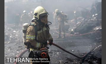 آتش سوزی انبار کالا در خیابان فداییان اسلام 14