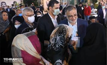 افطاری شهردار تهران با حضور خانواده شهدا 16