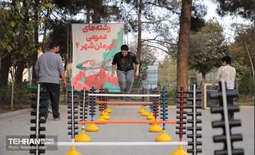 اختتامیه مسابقات ورزشی قهرمانان در منطقه 13 11