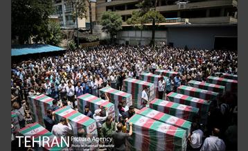 مراسم تشییع پیکرهای مطهر ۱۵۰ شهید تازه‌ تفحص‌ شده دفاع مقدس  - ۲ 39