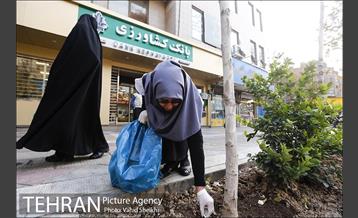 پاکسازی خیابان ولیعصر به مناسبت روز جهانی داوطلب 17