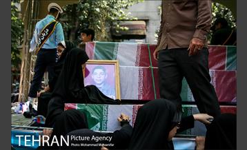 مراسم تشییع پیکرهای مطهر ۱۵۰ شهید تازه‌ تفحص‌ شده دفاع مقدس  - ۲ 23