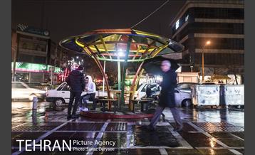 خیابان آیت در یک روز بارانی 9