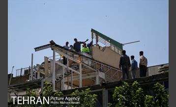 رفع خطر طبقه سوم پاساژ 102 در خیابان امام خمینی(ره)  35