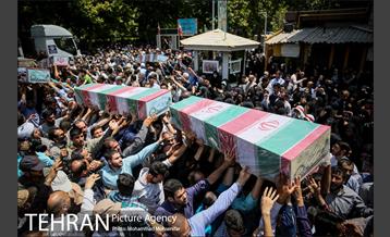 مراسم تشییع پیکرهای مطهر ۱۵۰ شهید تازه‌ تفحص‌ شده دفاع مقدس  - ۲ 27