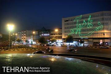 نورپردازی لیزری ویژه ولادت امام رضا(ع) در میدان انقلاب اسلامی 9