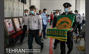 آیین پرچم گردانی حرم امام رضا در ایستگاه آتشنشانی 6