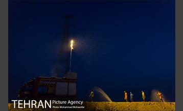 عملیات تخلیه آب از شهرک پیام اهواز 21