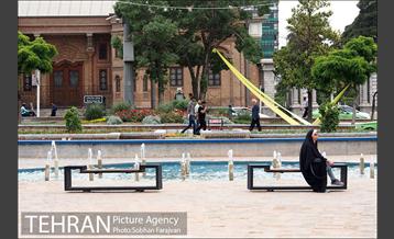 میدان بهارستان 9