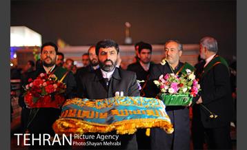 اهتزاز پرچم مسجد جمکران در برج میلاد 8