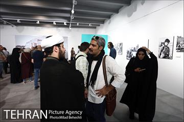 آیین گشایش نمایشگاه عکس ساسان مویدی و رونمایی از مجموعه کتب عکاسان جنگ 14