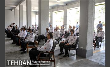 آیین پرچم گردانی حرم امام رضا در ایستگاه آتشنشانی 11