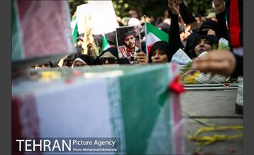 مراسم تشییع پیکرهای مطهر ۱۵۰ شهید تازه‌ تفحص‌ شده دفاع مقدس  - ۲ 6