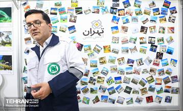 حضور علی نصیری رئیس سازمان پیشگیری و مدیریت بحران استان تهران در غرفه آژانس عکس تهران