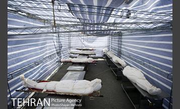 تطهیر و تدفین جانباختگان کرونایی در بهشت زهرا(س) 19