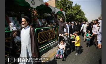 مراسم تشییع پیکرهای مطهر ۱۵۰ شهید تازه‌ تفحص‌ شده دفاع مقدس  - ۲ 9