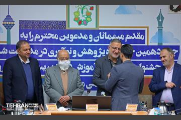 آیین اختتامیه چهاردمین جشنواره پژوهش و نوآوری در مدیریت شهری 32
