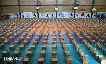 رزمایش همدلی و توزیع ۱۴۰۰۰ بسته معیشتی بین پاکبابان شهر تهران 6