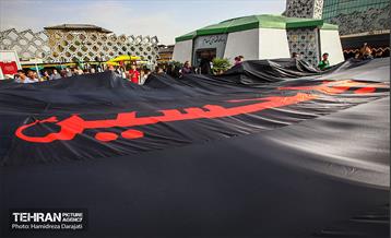 اهتزاز اَبَر پرچم متبرک ابا عبدالله حسین(ع) 13