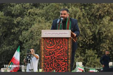 اهتزاز پرچم عزای حسینی بر فراز برج پرچم ایران 20