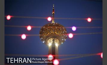 اهتزاز پرچم حرم حضرت معصومه (س) در برج میلاد 31