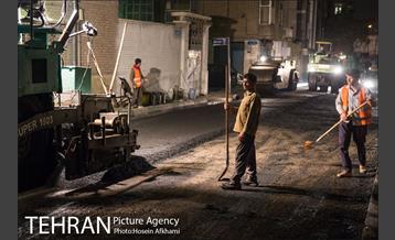 عملیات آسفالت ریزی در ناحیه یک منظقه هفت‎ 11