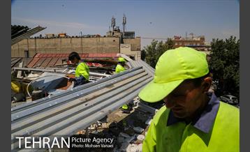 رفع خطر طبقه سوم پاساژ 102 در خیابان امام خمینی(ره)  1