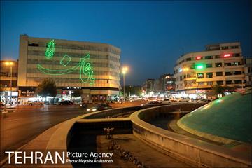نورپردازی لیزری ویژه ولادت امام رضا(ع) در میدان انقلاب اسلامی 2