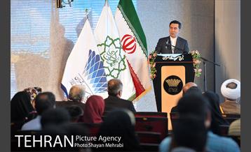 اهتزاز پرچم حرم حضرت معصومه (س) در برج میلاد 7