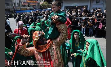 عزاداری ظهر عاشورای حسینی در چهار راه گلوبندک 17