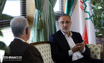 دیدار سفیر ایران در قطر با شهردار تهران