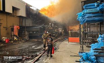 حریق در بازار آهن شادآباد 25