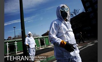 بازدید شهردار تهران از عملیات ضد عفونی کردن اتوبوس های شهری 6