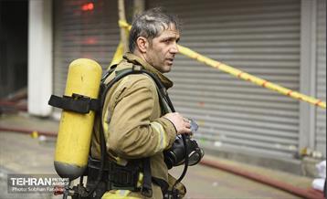 آتش سوزی در خیابان بهار تهران 71