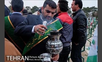 غبارروبی مزار شهدای آتش نشان باحضور خادمین حرم معصومه (س) 20