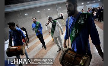 اهتزاز پرچم حرم حضرت معصومه (س) در برج میلاد 13