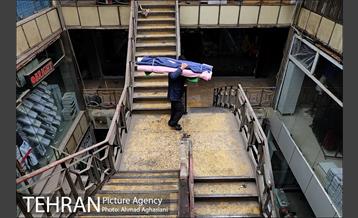 تخلیه اجناس مغازه های باقی مانده ساختمان پلاسکو -1 13