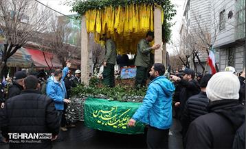 مراسم تشییع پیکر شهید مدافع حرم «حسین محمدی» 7