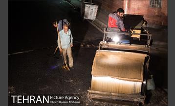 عملیات آسفالت ریزی در ناحیه یک منظقه هفت‎ 14