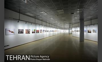 تجلیل از خانواده شهدای آتش‌نشان حادثه پلاسکو با حضور شهردار تهران 57