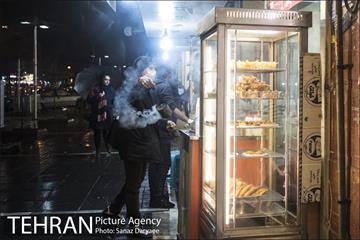 خیابان آیت در یک روز بارانی 10