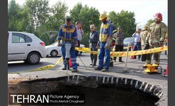 انجام عملیات ترمیم و بازسازی نشست زمین بزرگراه صیاد شیرازی 7