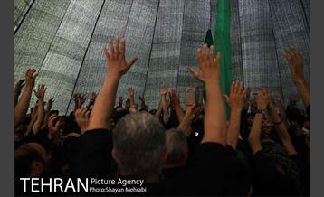 عزاداری ظهر عاشورای حسینی در چهار راه گلوبندک 13