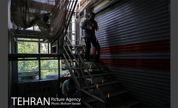 رفع خطر طبقه سوم پاساژ 102 در خیابان امام خمینی(ره)  21