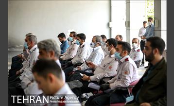 آیین پرچم گردانی حرم امام رضا در ایستگاه آتشنشانی 13