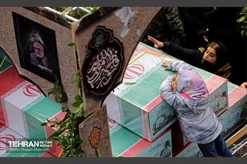 تشییع پیکر ۲۰۰ شهید گمنام دفاع مقدس در تهران 14