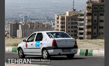 رقـابت یکصد خودرو در رالی تهران  19